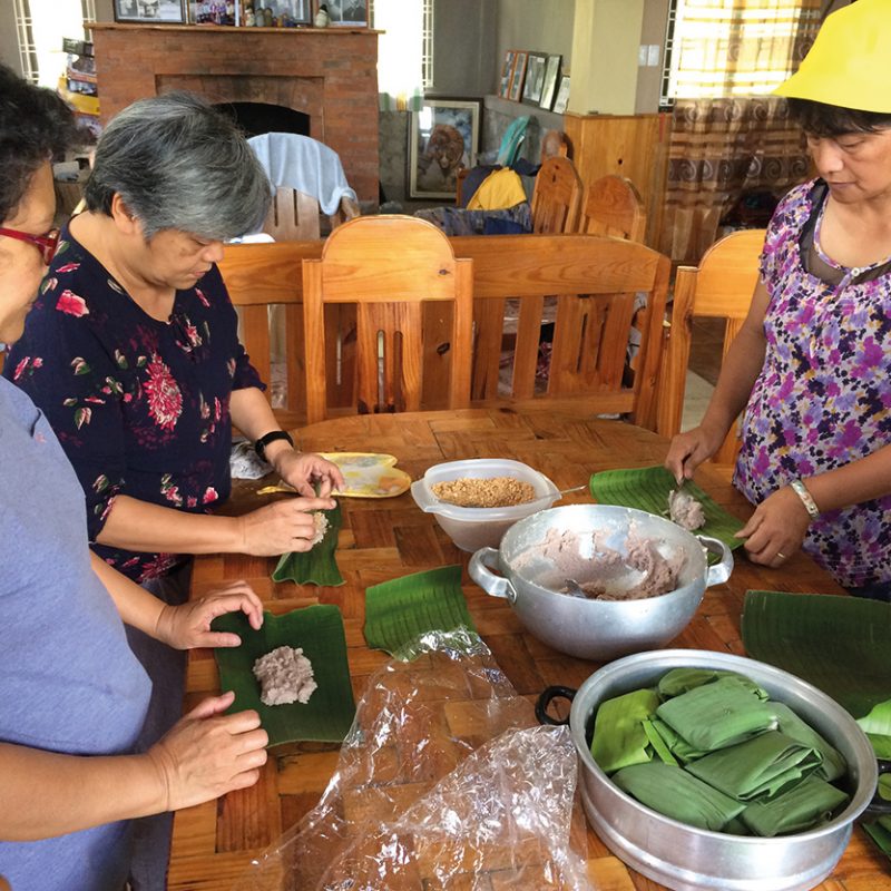 Making imbuleh, an indigenous dish from the Cordillera. Credit: PIKP.